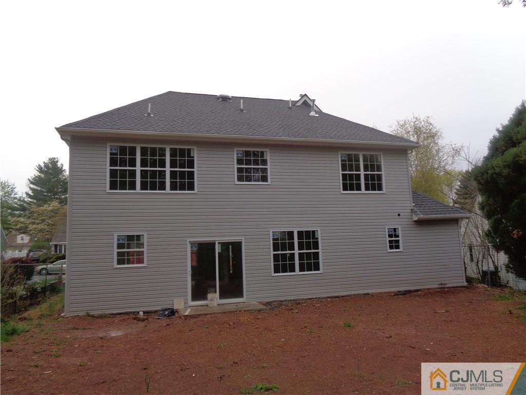 15 Altamont Road Edison, NJ 08817 - Photo 7 of 7 a front view of a house with a yard