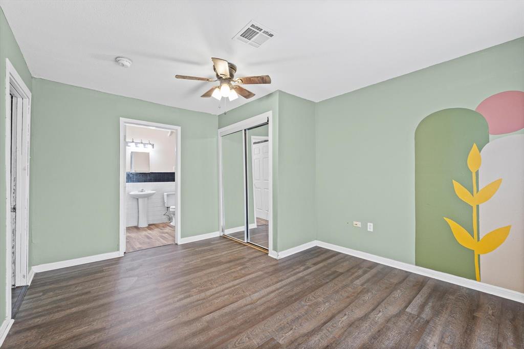 1208 Sunset Street Waco, TX 76710 - Photo 15 of 24 a view of empty room with wooden floor