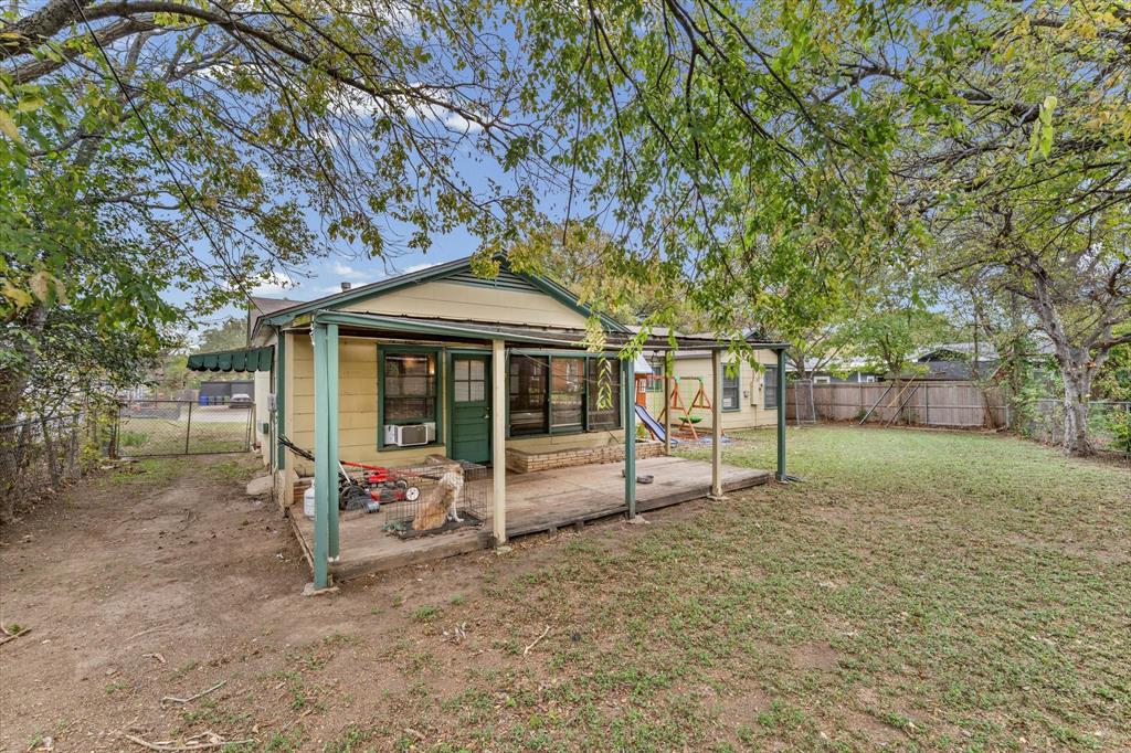 1208 Sunset Street Waco, TX 76710 - Photo 18 of 24 a view of house with a yard