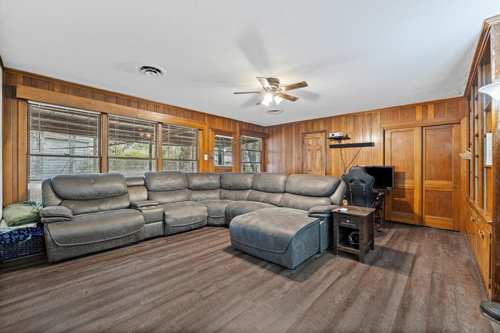 1208 Sunset Street Waco, TX 76710 - Photo 8 of 24 a living room with furniture and a wooden floor