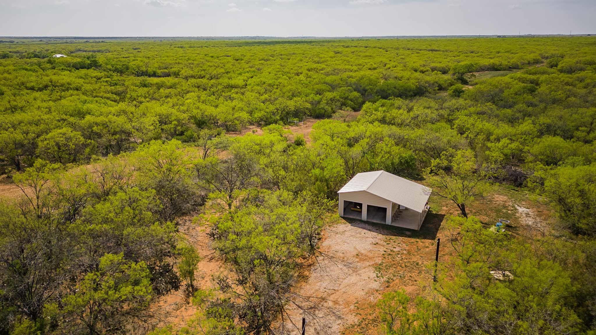 0 Bluntzer Road Jourdanton, TX 78026 - Photo 15 of 30 a view of a lake with a city