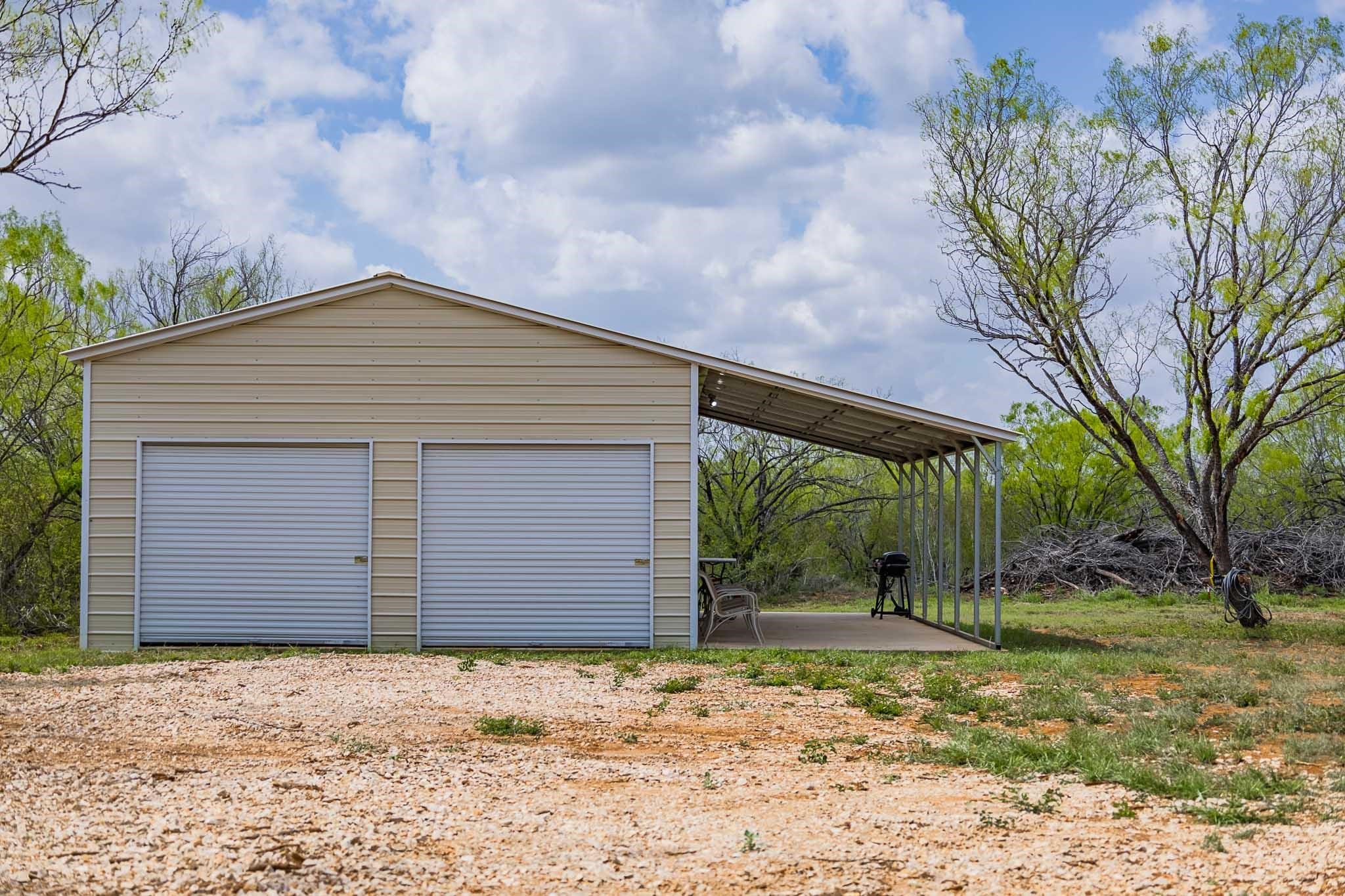 0 Bluntzer Road Jourdanton, TX 78026 - Photo 4 of 30 a backyard of a house