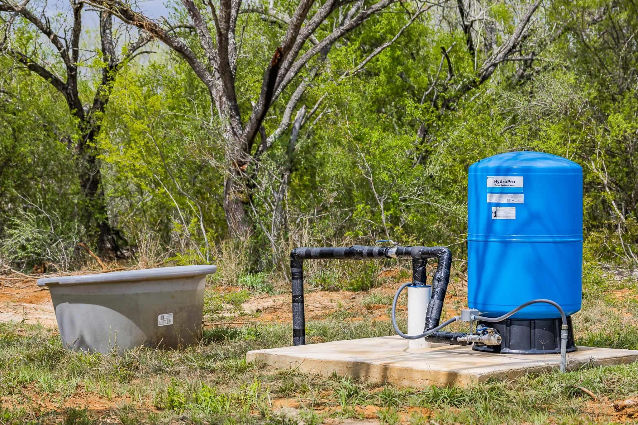 0 Bluntzer Road Jourdanton, TX 78026 - Photo 7 of 30 a view of a chairs and table in the backyard