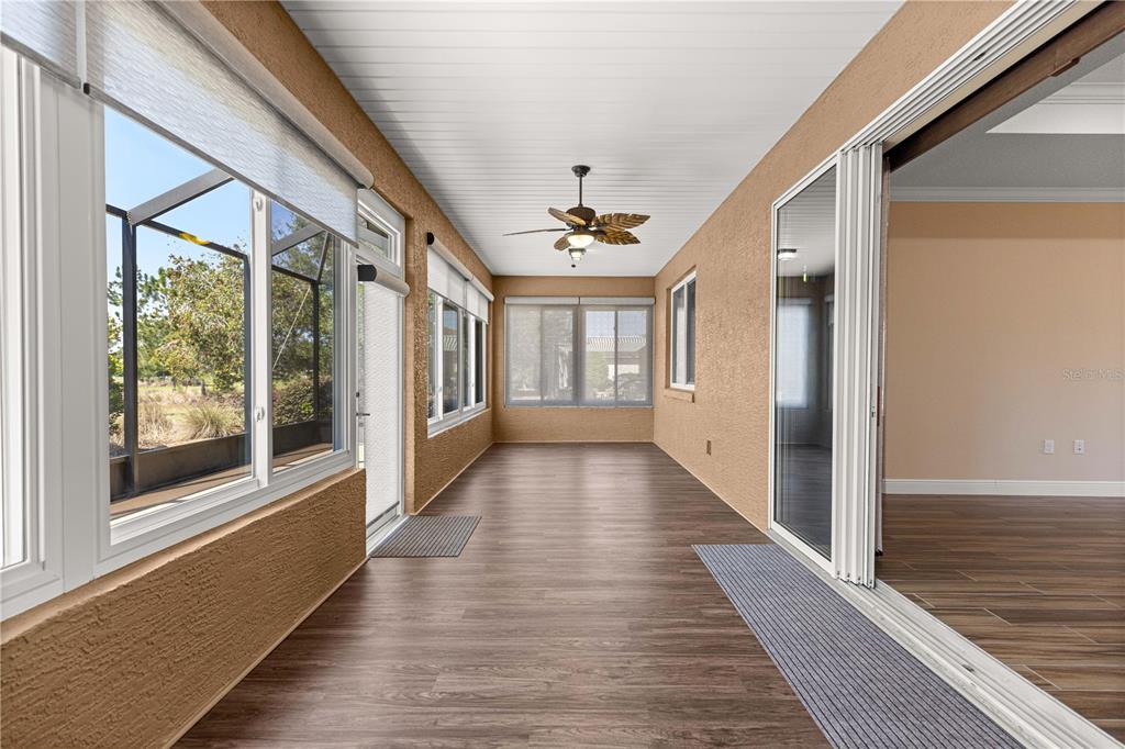 9460 Southwest 86th Place Ocala, FL 34481 - Photo 57 of 86 a view of a house with wooden floor and windows