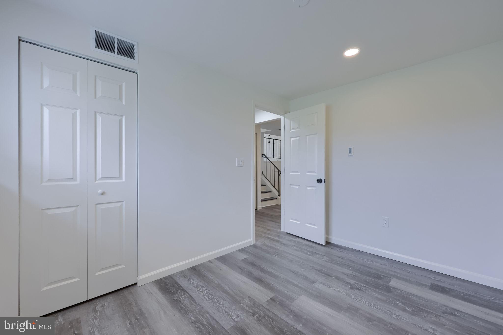 106 Warren Way Lancaster, PA 17601 - Photo 17 of 32 a view of empty room with wooden floor
