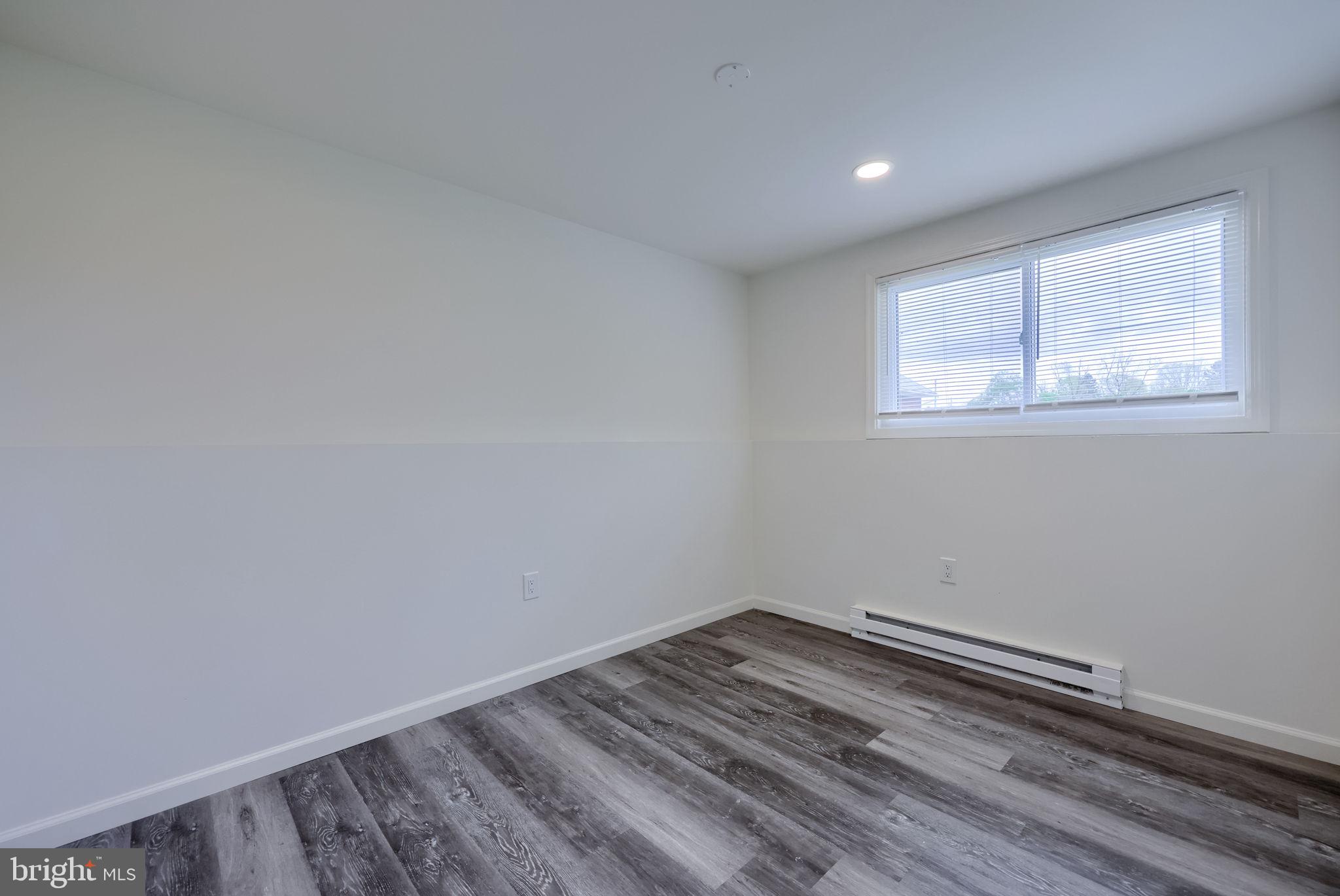 106 Warren Way Lancaster, PA 17601 - Photo 18 of 32 a view of a room with wooden floor and natural light