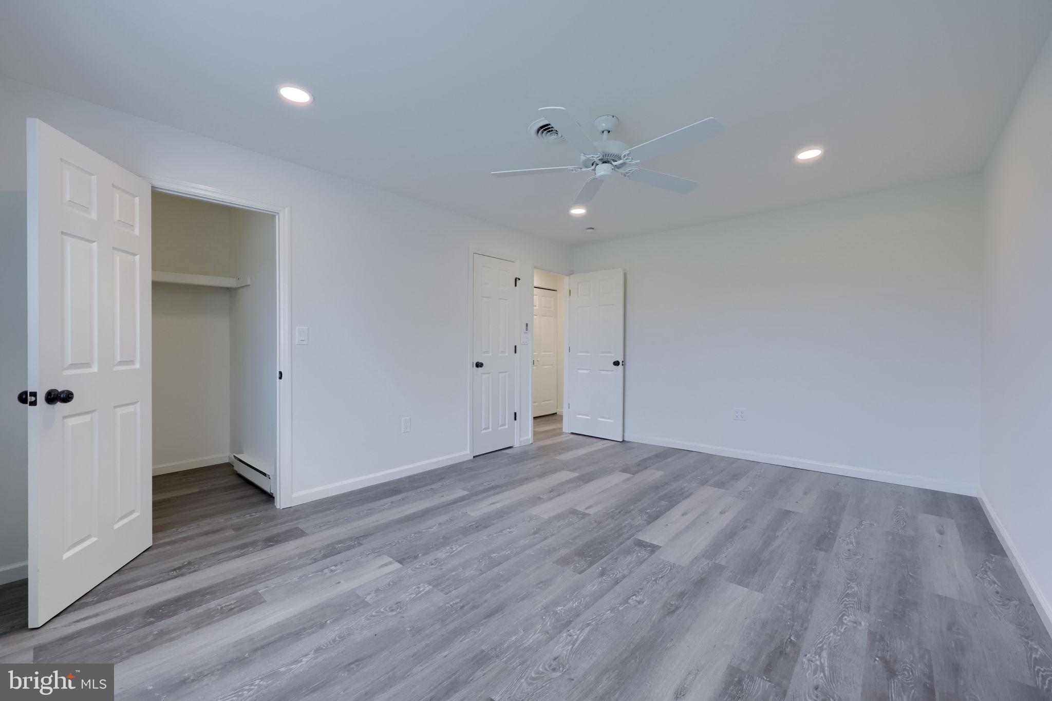 106 Warren Way Lancaster, PA 17601 - Photo 21 of 32 a view of an empty room with wooden floor