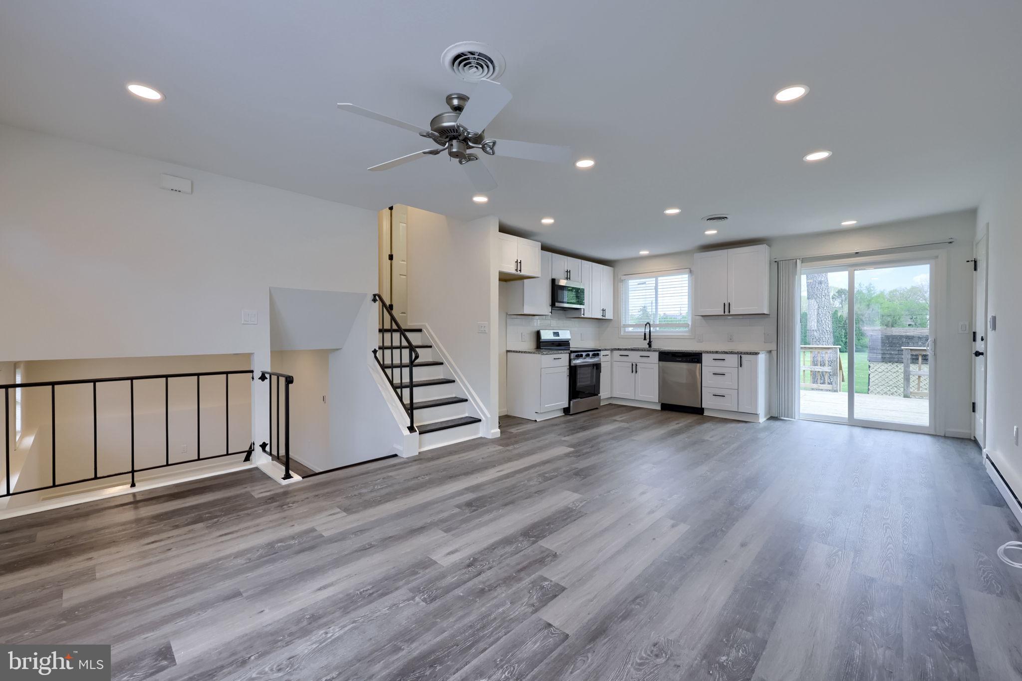 106 Warren Way Lancaster, PA 17601 - Photo 6 of 32 a view of kitchen with furniture and wooden floor