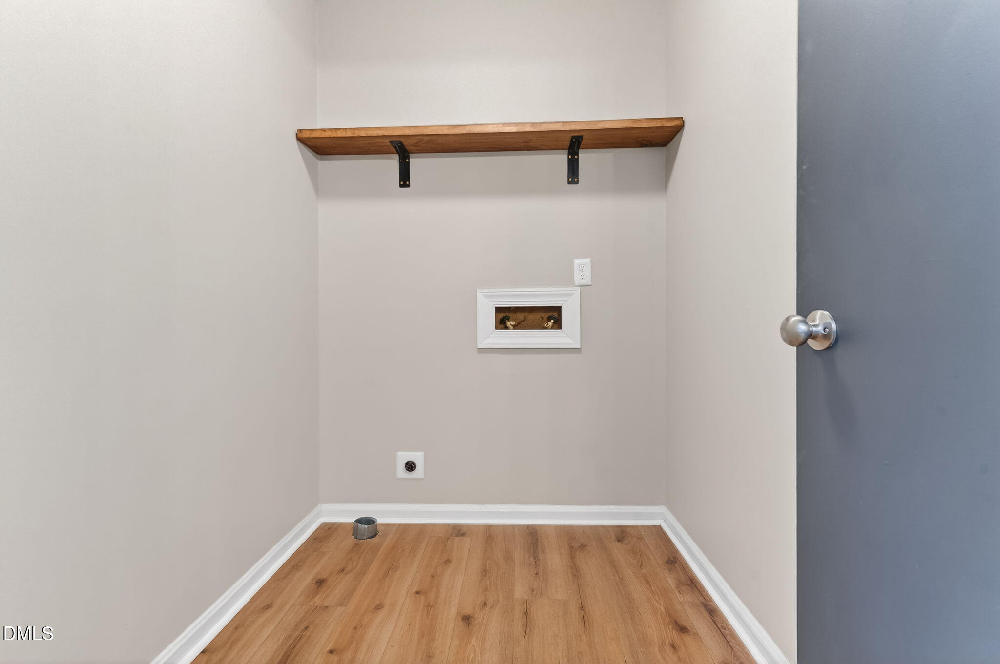 6086 Red Hill Church Road Coats, NC 27521 - Photo 14 of 44 a view of a small room with wooden floor