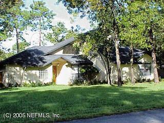 1958 Derringer Road Jacksonville, FL 32225 - Photo 1 of 1 a view of a park with large trees