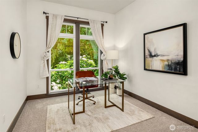 a workspace with furniture and a window