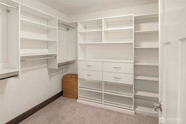 a view of an empty walk in closet