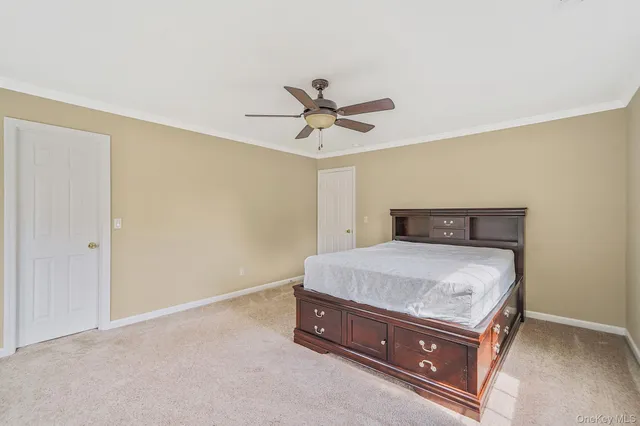 a room with a bed and window