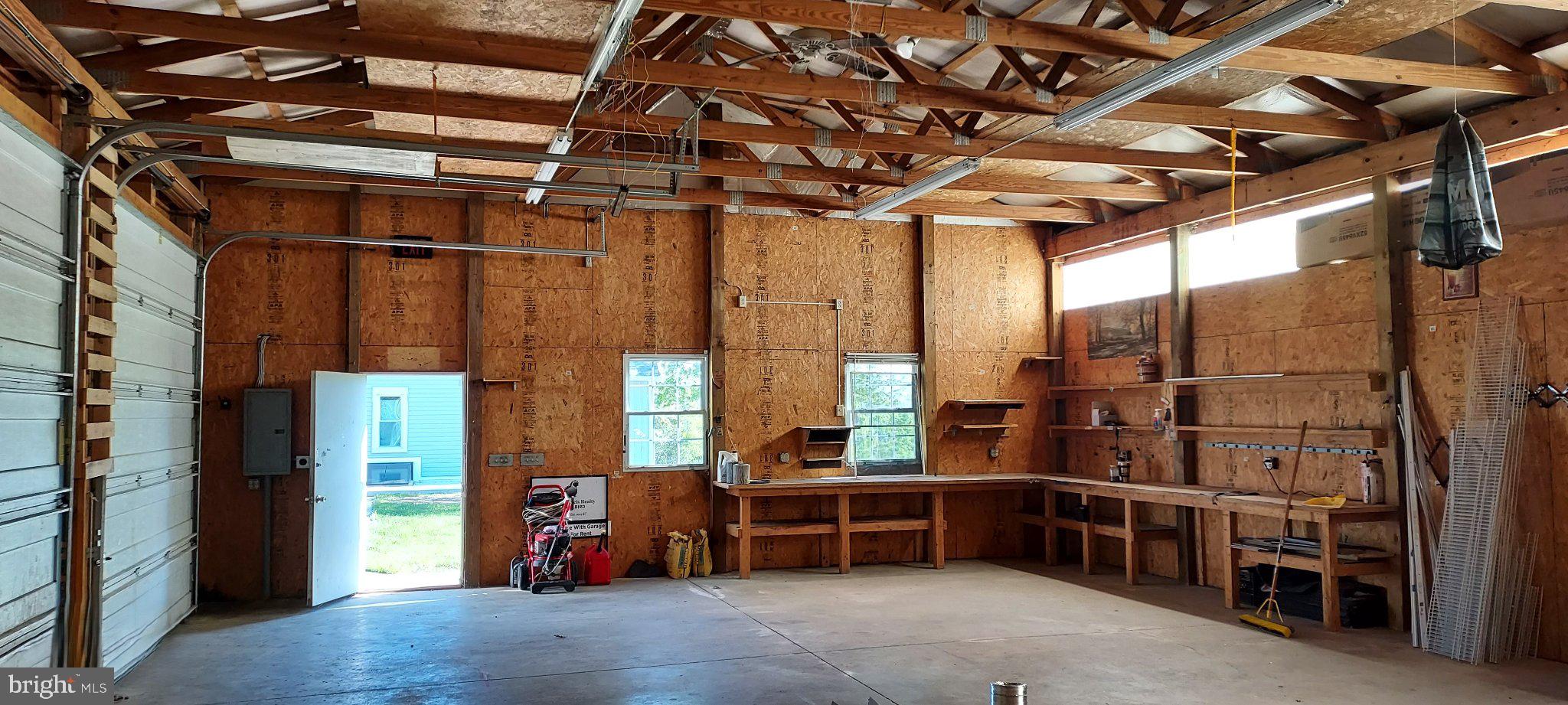 128 Maugers Mill Road Pottstown, PA 19464 - Photo 36 of 42 Spacious workshop with natural light.