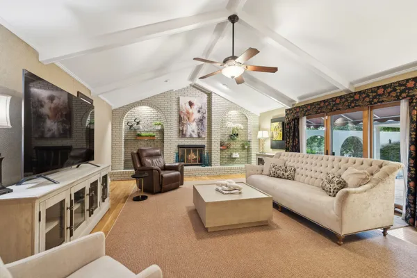 a living room with furniture and a couch
