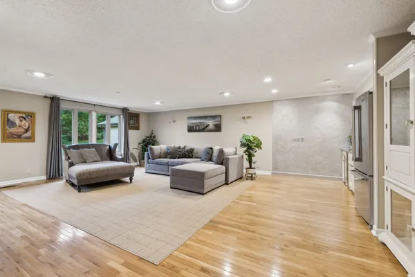 a bedroom with a bed and a mirror