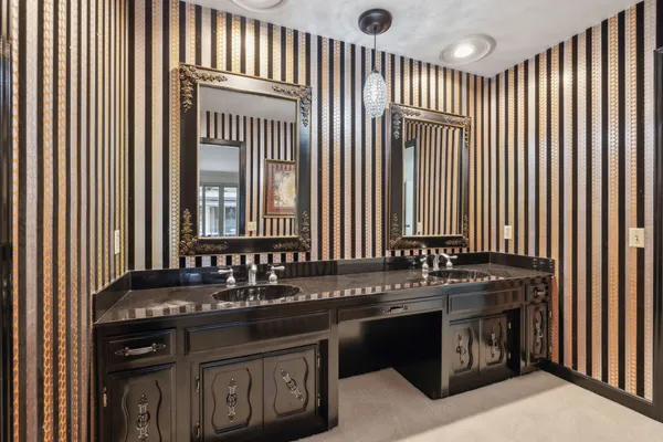 a view of a swimming pool with a porch