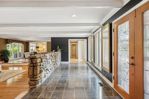 a view of a room that has a balcony