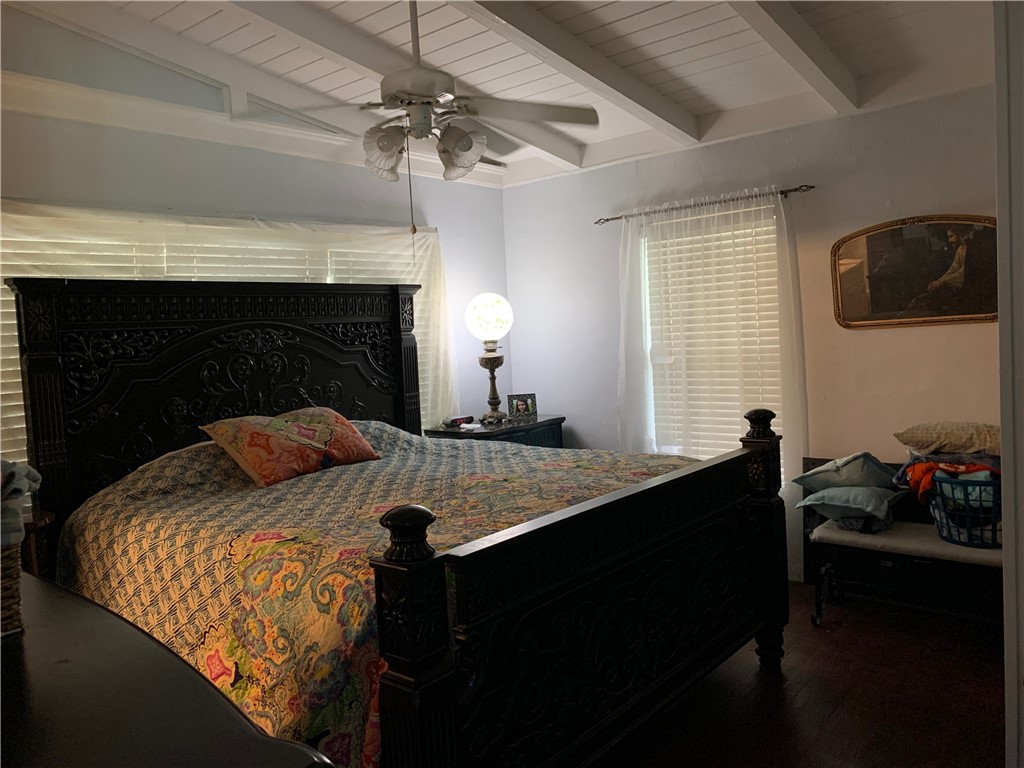 143 Trail Ridge Drive Sandia, TX 78383 - Photo 13 of 40 a bed room with a bed and a television