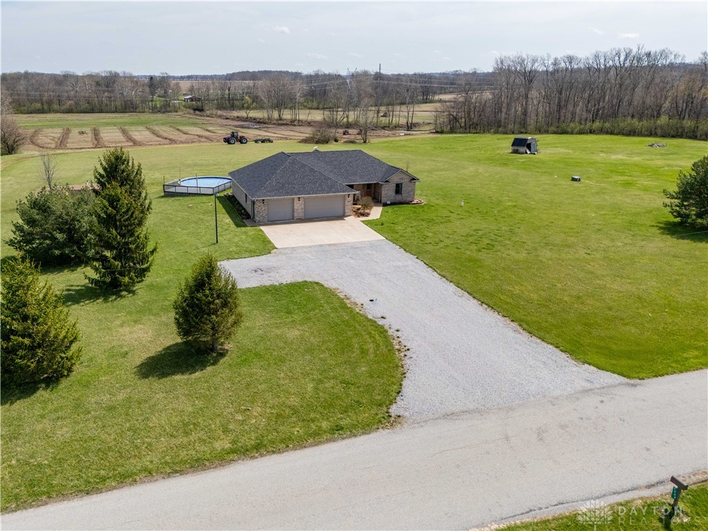 5264 Frazier-Guy Road Sidney, OH 45365 - Photo 5 of 51 This expansive property features a welcoming home, a large yard, and distant natural views.