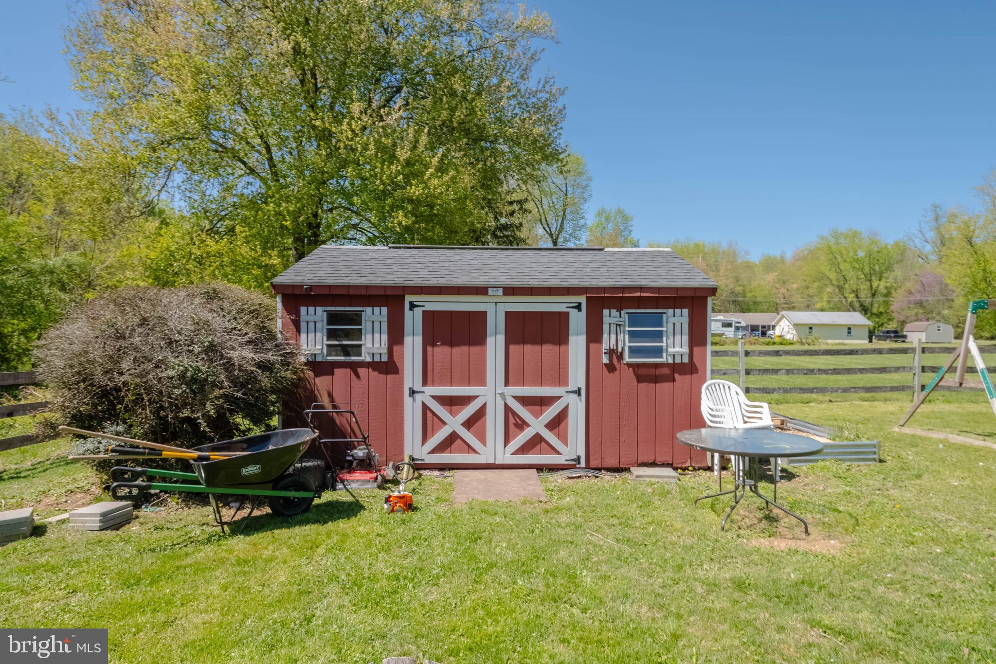 4007 Lee Road Aberdeen, MD 21001 - Photo 42 of 57 a backyard of a house with table and chairs