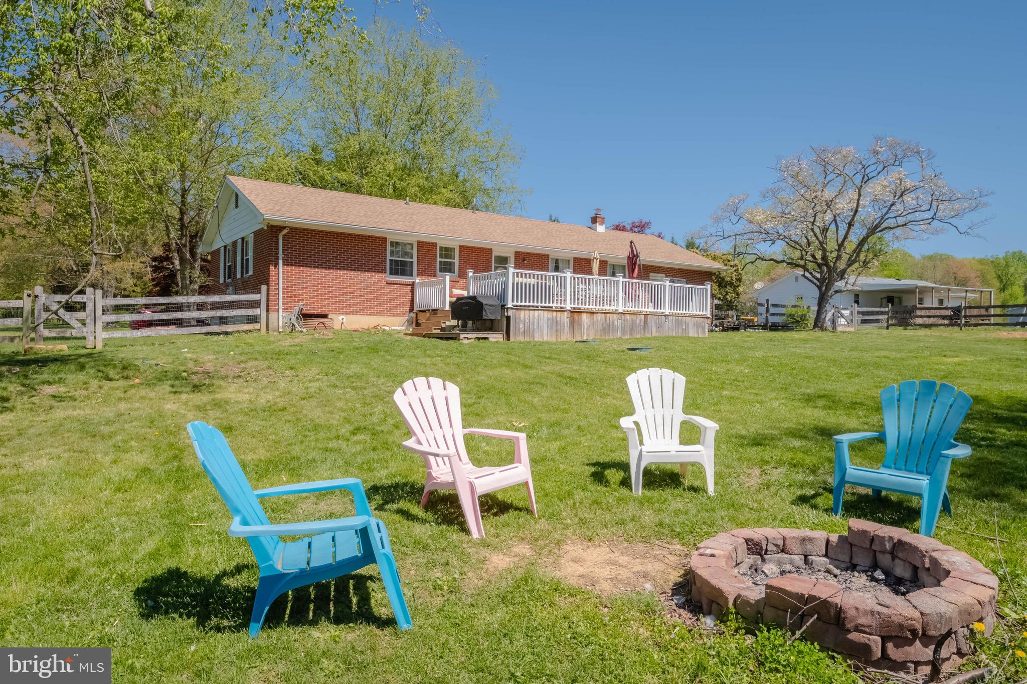 4007 Lee Road Aberdeen, MD 21001 - Photo 43 of 57 a view of a chair and table in backyard of the house