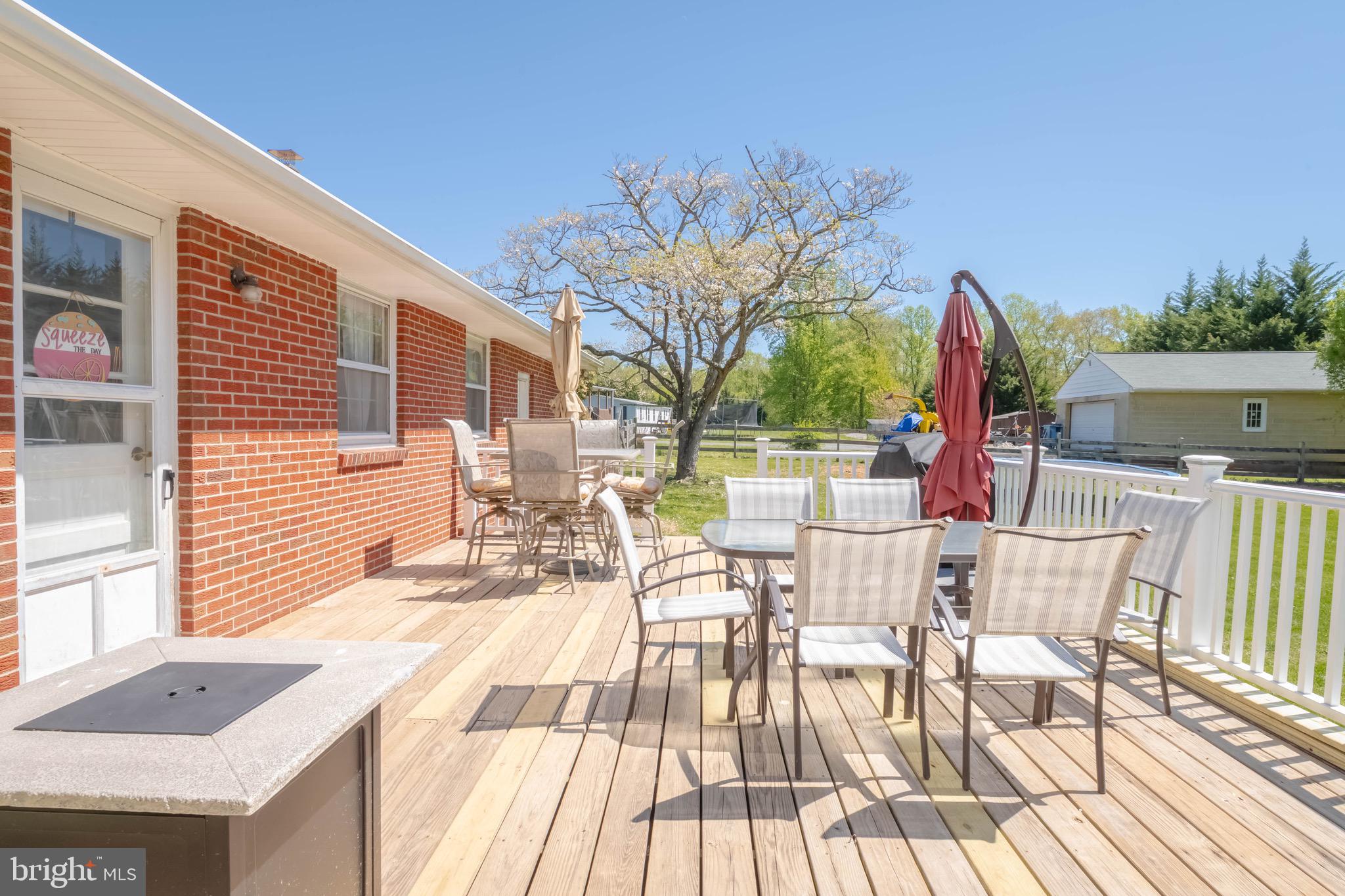 4007 Lee Road Aberdeen, MD 21001 - Photo 53 of 57 a view of a patio with table and chairs and potted plants