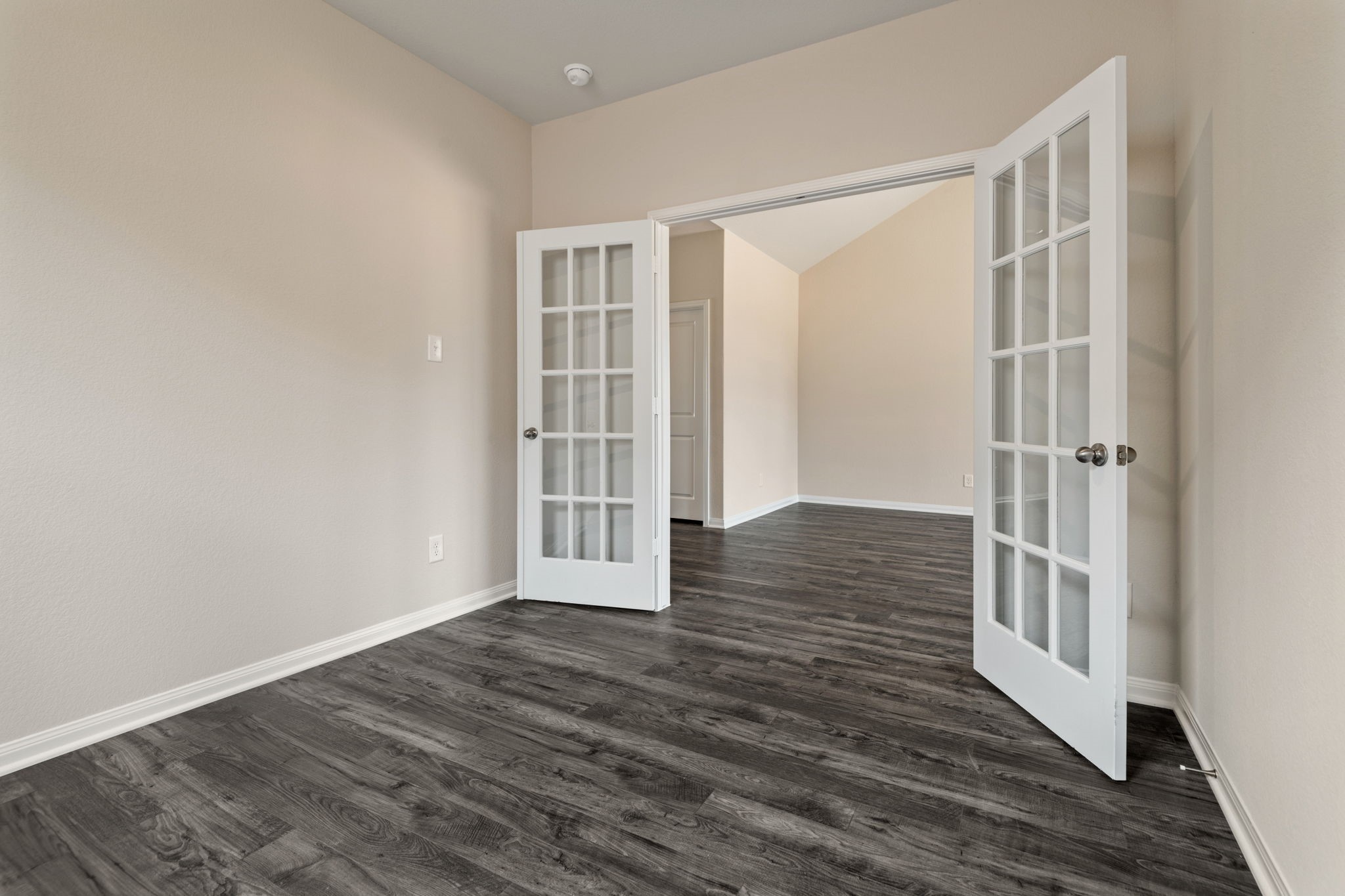 345 Fastboy Lane Waller, TX 77484 - Photo 4 of 12 wooden floor in an empty room