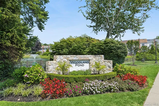 a sign on the side of the park