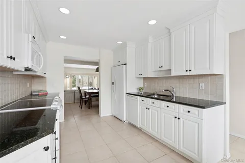 $938,000 | 137 Woodlake Drive West, Woodbury, NY 11797