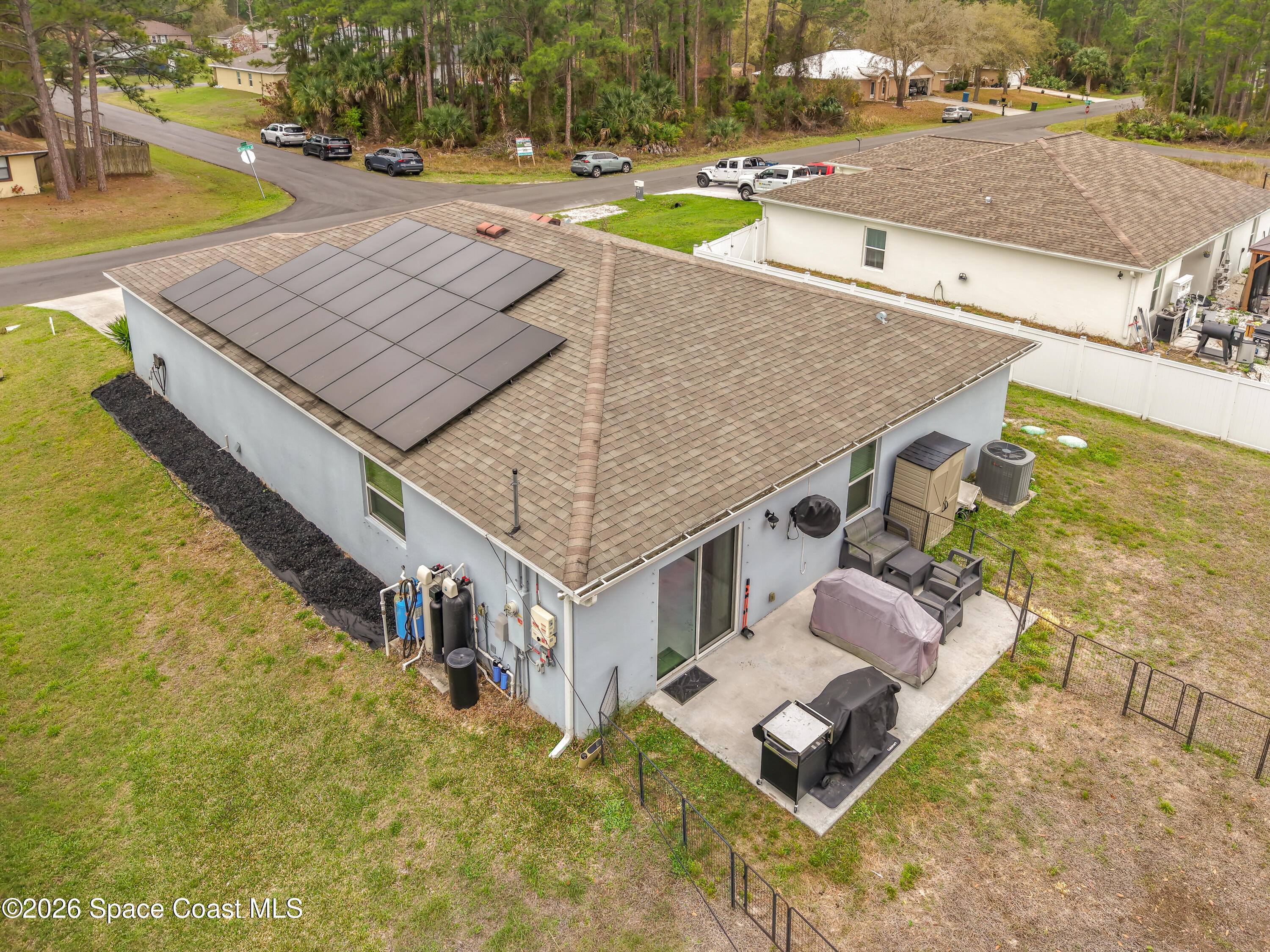 415 Scodella Street Southwest Palm Bay, FL 32908 - Photo 48 of 54 an aerial view of a house with swimming pool