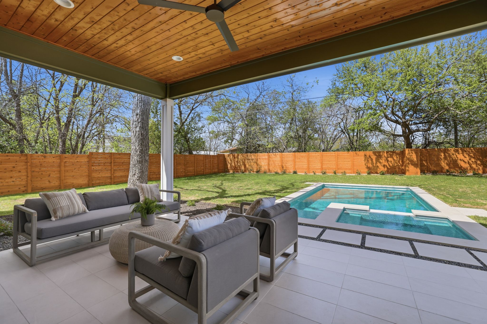 4500 Jinx Avenue Austin, TX 78745 - Photo 37 of 40 Fenced backyard with outdoor lounge area, a pool with connected hot tub, a patio area, and ceiling fan
