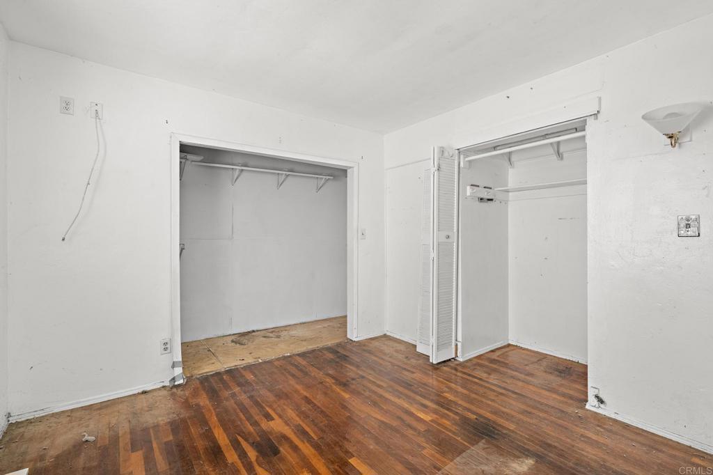 844 Saxony Road Encinitas, CA 92024 - Photo 15 of 31 a view of empty room with wooden floor