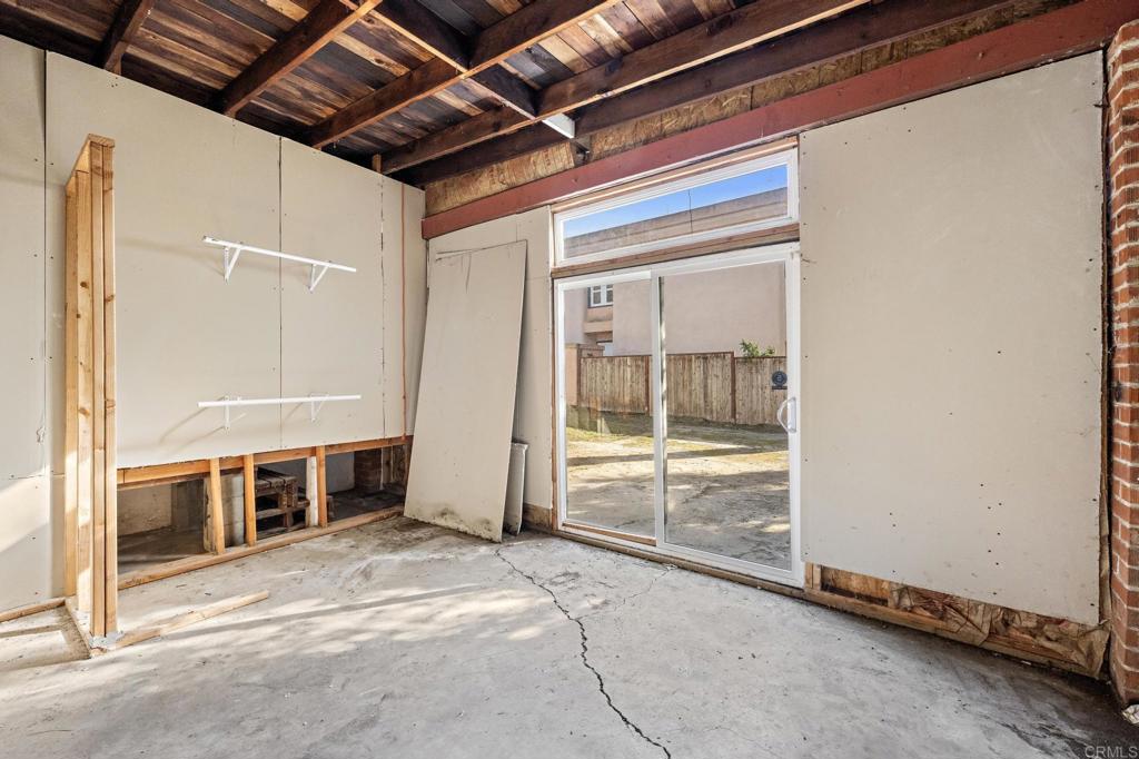 844 Saxony Road Encinitas, CA 92024 - Photo 22 of 31 a view of an empty room with a window