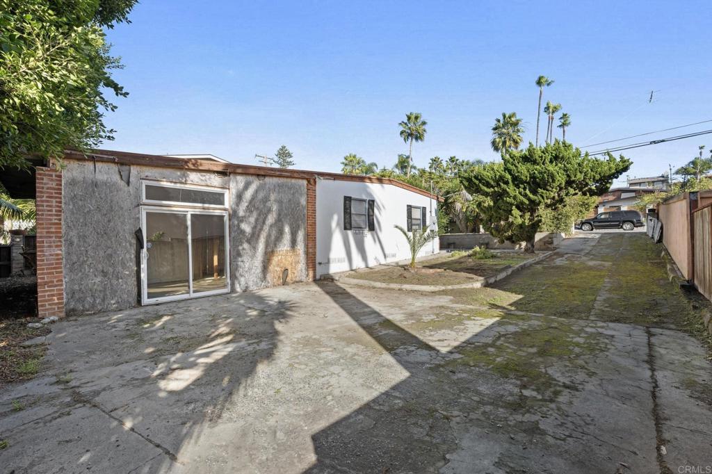 844 Saxony Road Encinitas, CA 92024 - Photo 26 of 31 a front view of a house with a yard