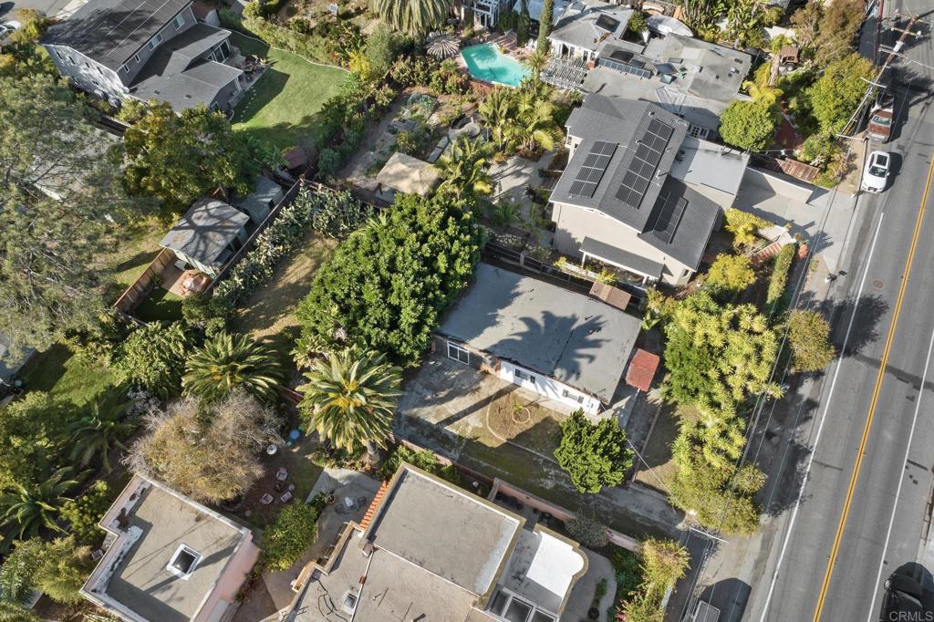 844 Saxony Road Encinitas, CA 92024 - Photo 4 of 31 an aerial view of a house with a yard