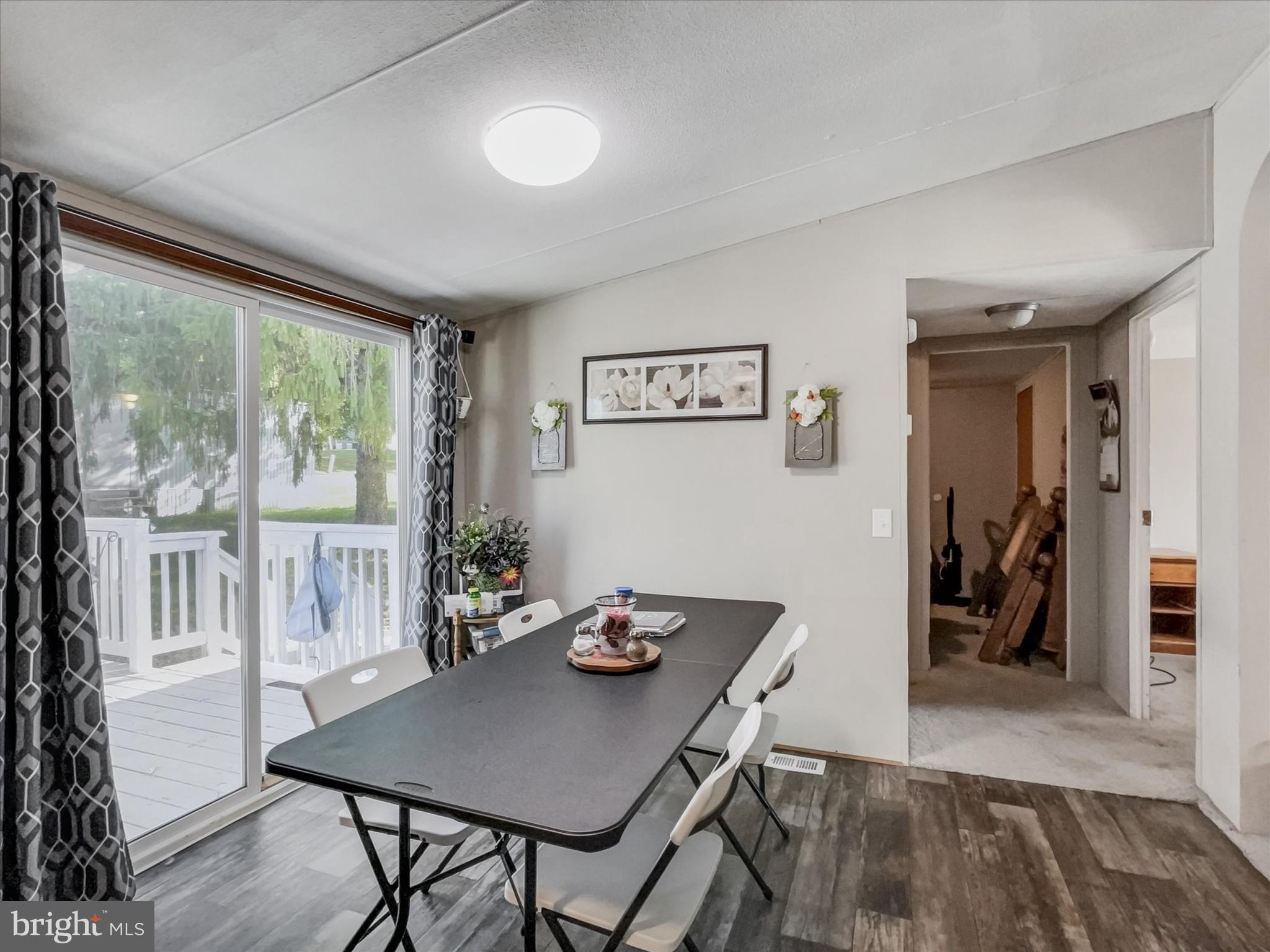 43 B Street York, PA 17408 - Photo 12 of 23 a view of a dining room with furniture window and wooden floor
