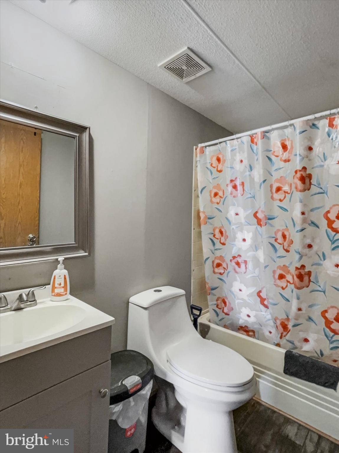 43 B Street York, PA 17408 - Photo 15 of 23 a white toilet sitting next to a bathroom sink