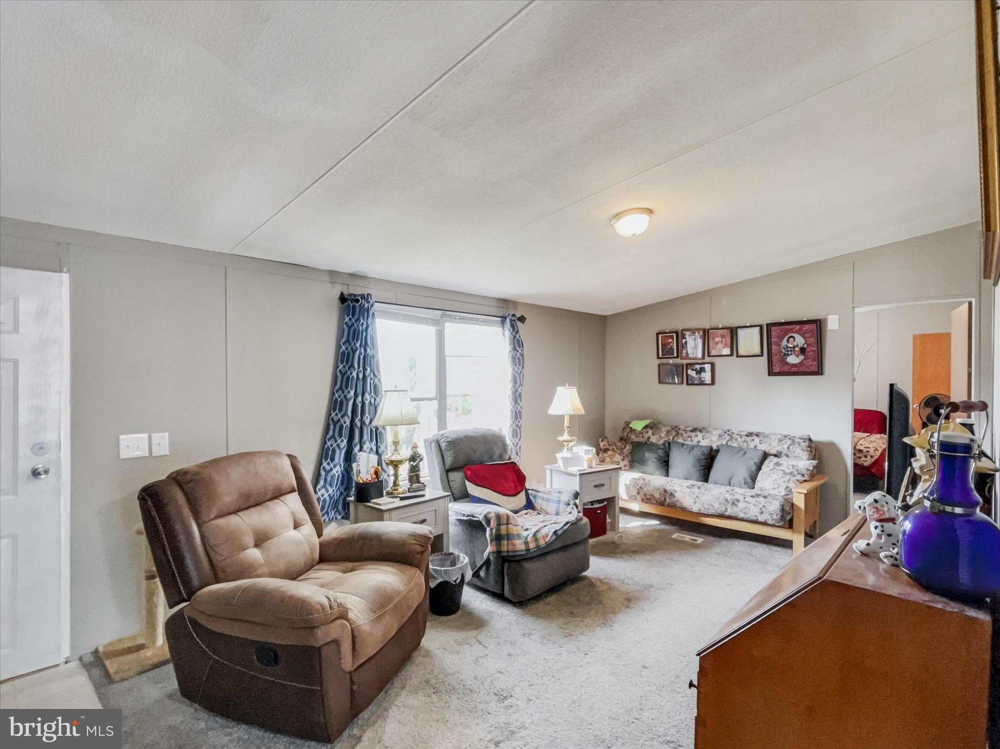 43 B Street York, PA 17408 - Photo 2 of 23 a living room with furniture or couch and a window