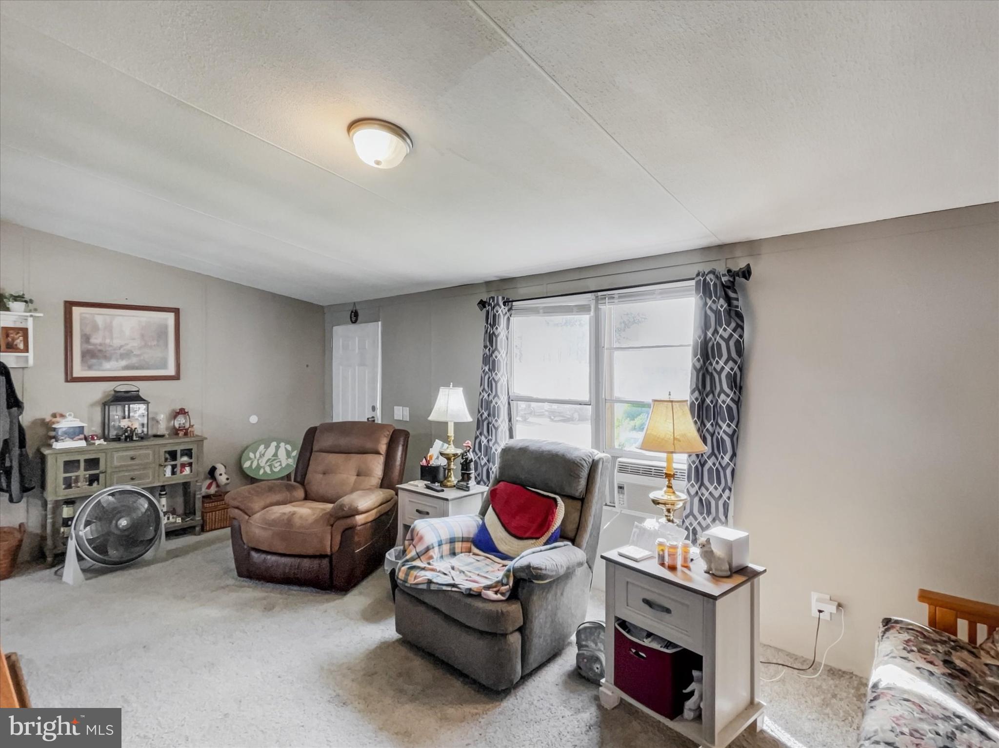 43 B Street York, PA 17408 - Photo 4 of 23 a living room with furniture and a window