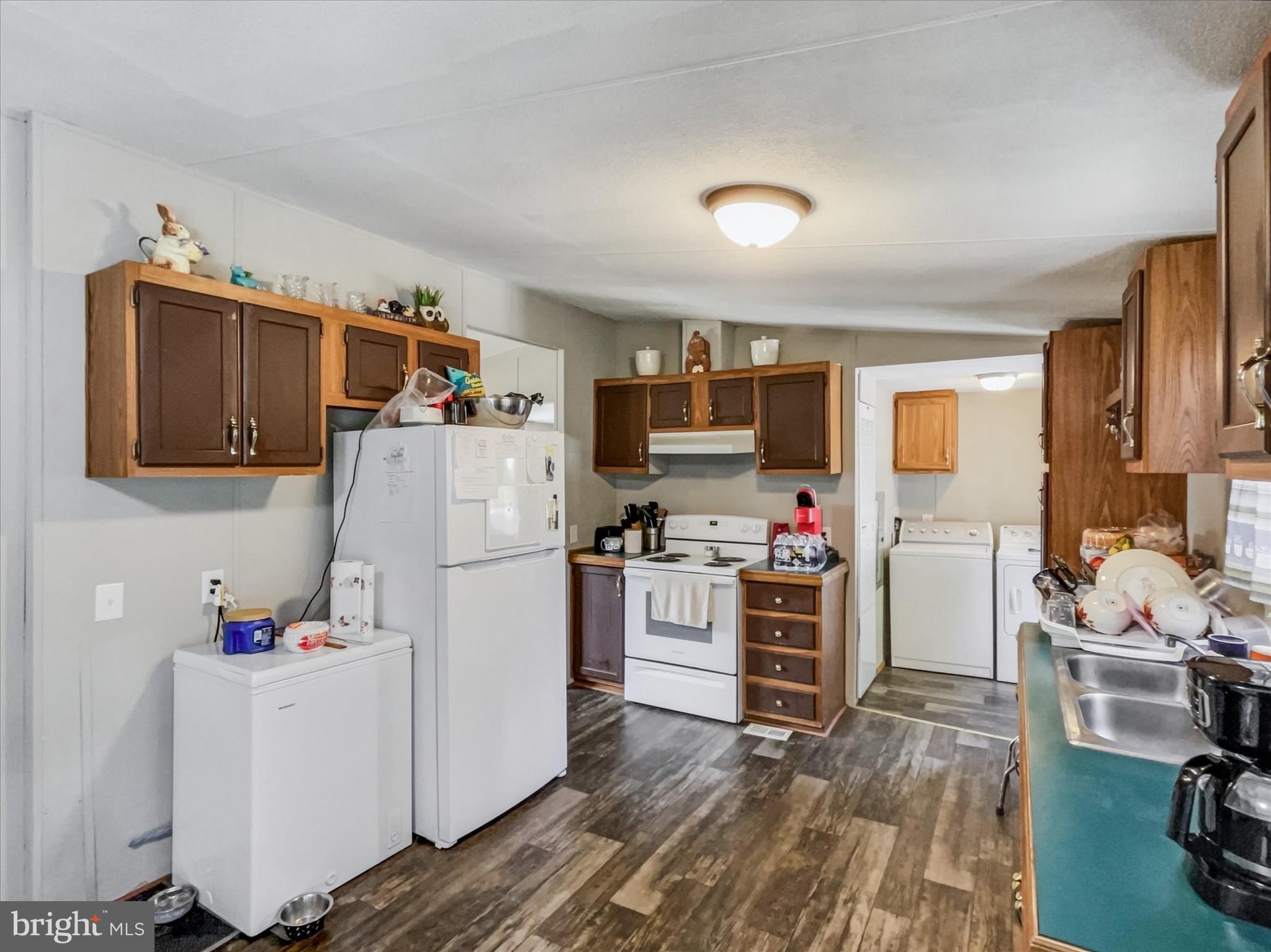 43 B Street York, PA 17408 - Photo 8 of 23 a white refrigerator freezer sitting in a kitchen