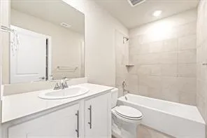 a bathroom with a double vanity sink and mirror