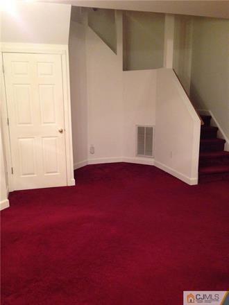 164 Eastern Way Rutherford, NJ 07070 - Photo 11 of 25 an empty room with windows