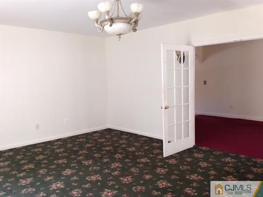 164 Eastern Way Rutherford, NJ 07070 - Photo 14 of 25 a view of an empty room with a window