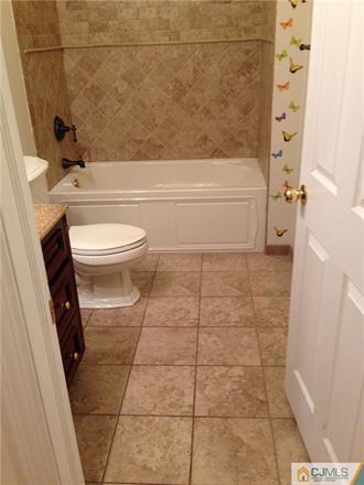 164 Eastern Way Rutherford, NJ 07070 - Photo 24 of 25 a bathroom with a toilet and a shower