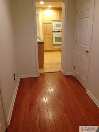 164 Eastern Way Rutherford, NJ 07070 - Photo 25 of 25 a view of empty room with wooden floor