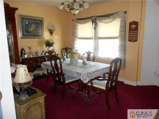 164 Eastern Way Rutherford, NJ 07070 - Photo 6 of 25 a view of a dining room with furniture window and outside view