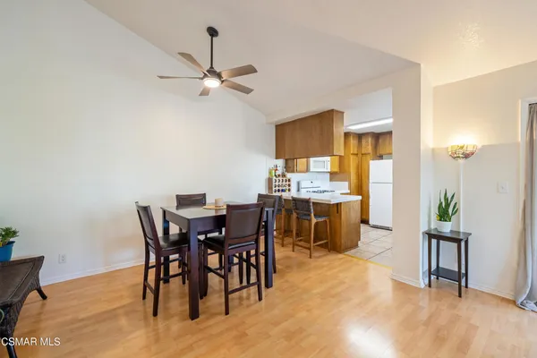 a view of a dining room with furniture
