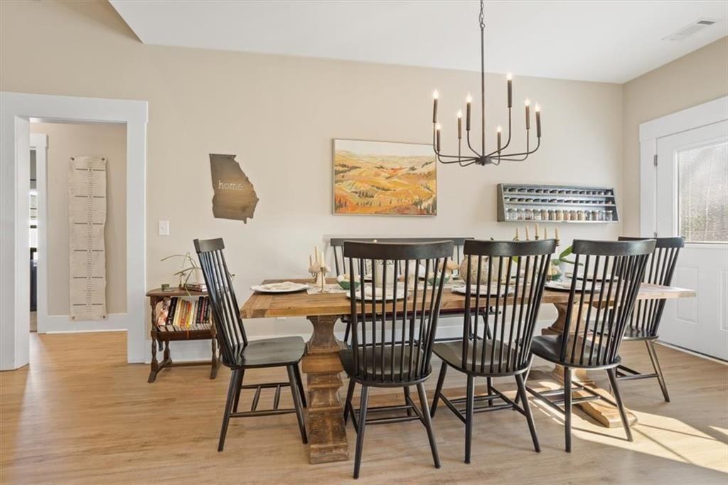 14402 Fincher Road Ball Ground, GA 30107 - Photo 14 of 55 a view of a dining room with furniture