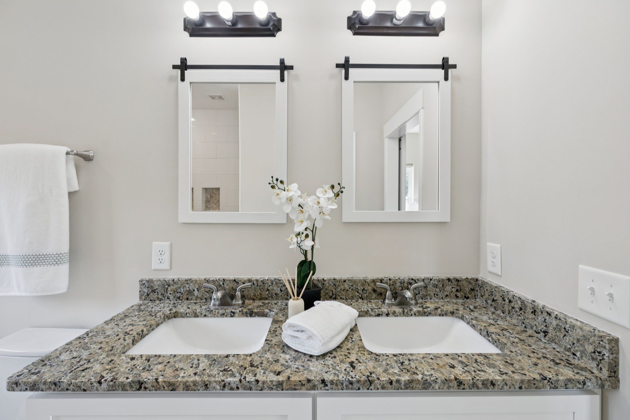 1317 Halls Mill Road Unionville, TN 37180 - Photo 19 of 41 a bathroom with a granite countertop sink and a mirror